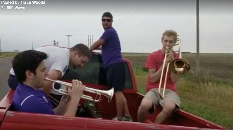 LisaGinKC's tweet photo. "It's like the epitome of Kansas." After a tire blowout, @KState band members play "Wabash Cannonball" in a pickup. https://t.co/wedf9oyyhC https://t.co/Tl9xKVC59S
