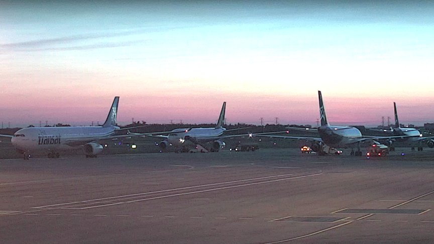 OttAviation's tweet photo. Hey @airtransat , look at all the Airstairs near your aircraft at #flyyow last night. Your statement contains fabrications. https://t.co/ShUbTXTiCS