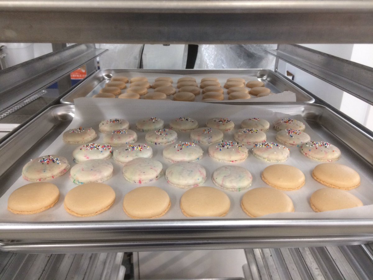 SkiBumSweets's tweet photo. Pretty trays of peach and sprinkles macarons ready to fill and sell! #macarons #peach #sprinkles #yummy #sweets #baking https://t.co/AgQUN0bdcJ