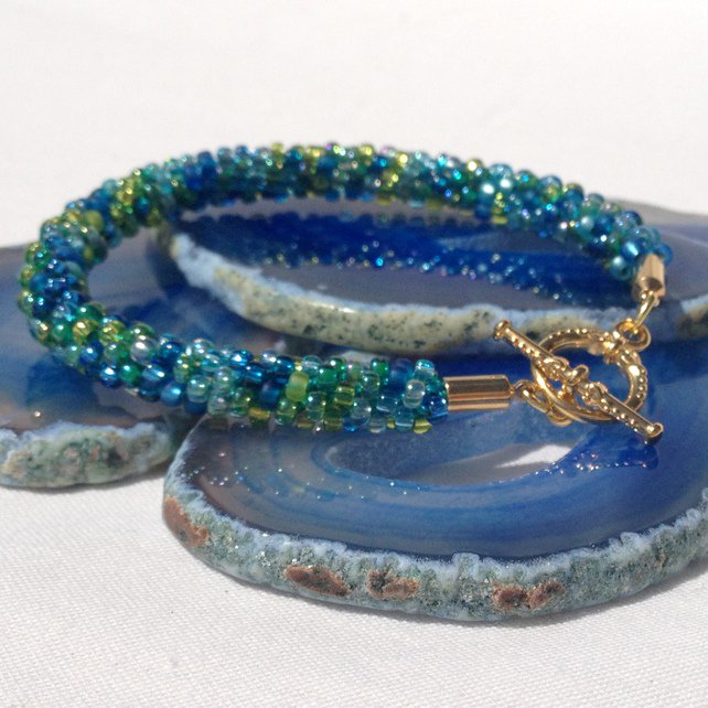 GoRadLou1's tweet photo. Blue Lagoon Kumihimo Bracelet new today at https://t.co/ygxnf83GcZ
#newonfolksy #handmade #onlinecraft #ukhashtags #Folksy365 https://t.co/cWyryltXNk