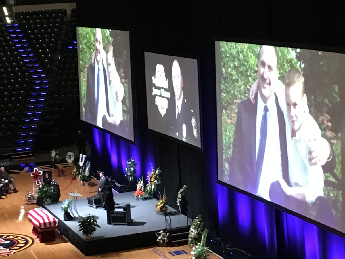 ISMAphysicians's tweet photo. Aisles on one side of the Pacers' floor lit in blue for funeral of #IMPD Deputy Chief #JamesWaters. https://t.co/hnfplQUsOc