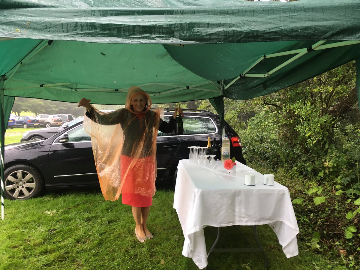 RoseGrissell's tweet photo. Calm before the rowdy crew arrive. Is it raining? I hadn't noticed. So very British...#GloriousGoodwood #picnic #bubblesplease #ponchoplease https://t.co/wGdPczA8ML
