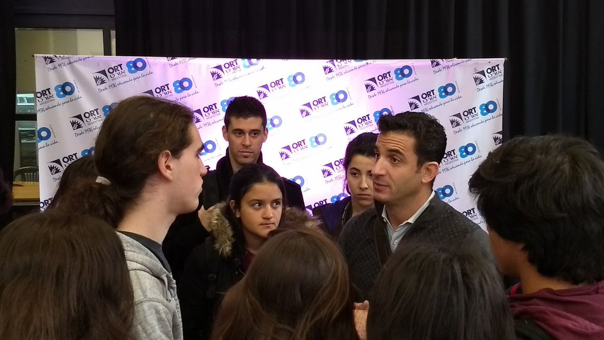ORTArgentina's tweet photo. Terminó la charla y una gran cantidad de alumnos se acerca a conversar con @matiastombolini, candidato a diputado nacional por #1País https://t.co/r3VilmJcPM