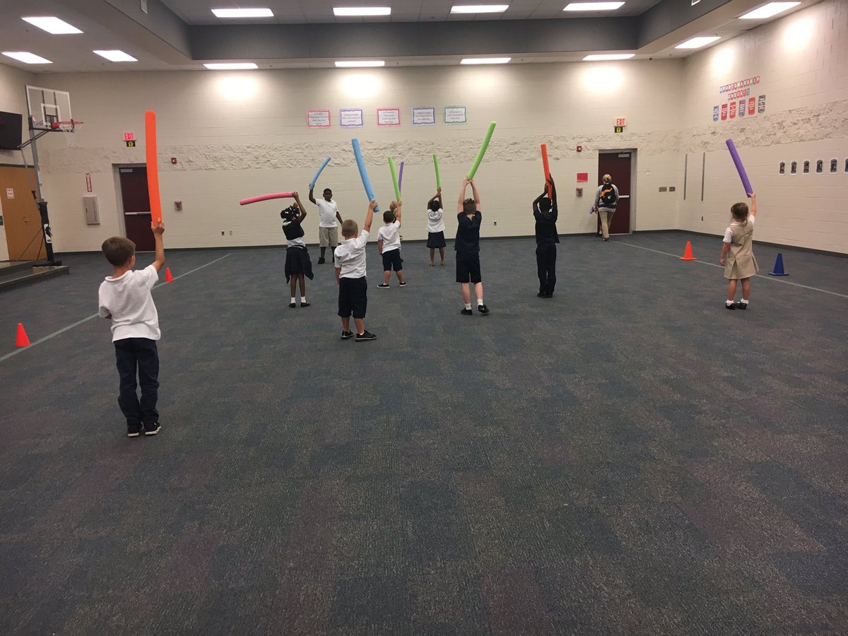 Using CYLINDERS with 1st grade in PE! #theyarentnoodlestoday #mathvocab #NWES #healthyactivejrcardinals
