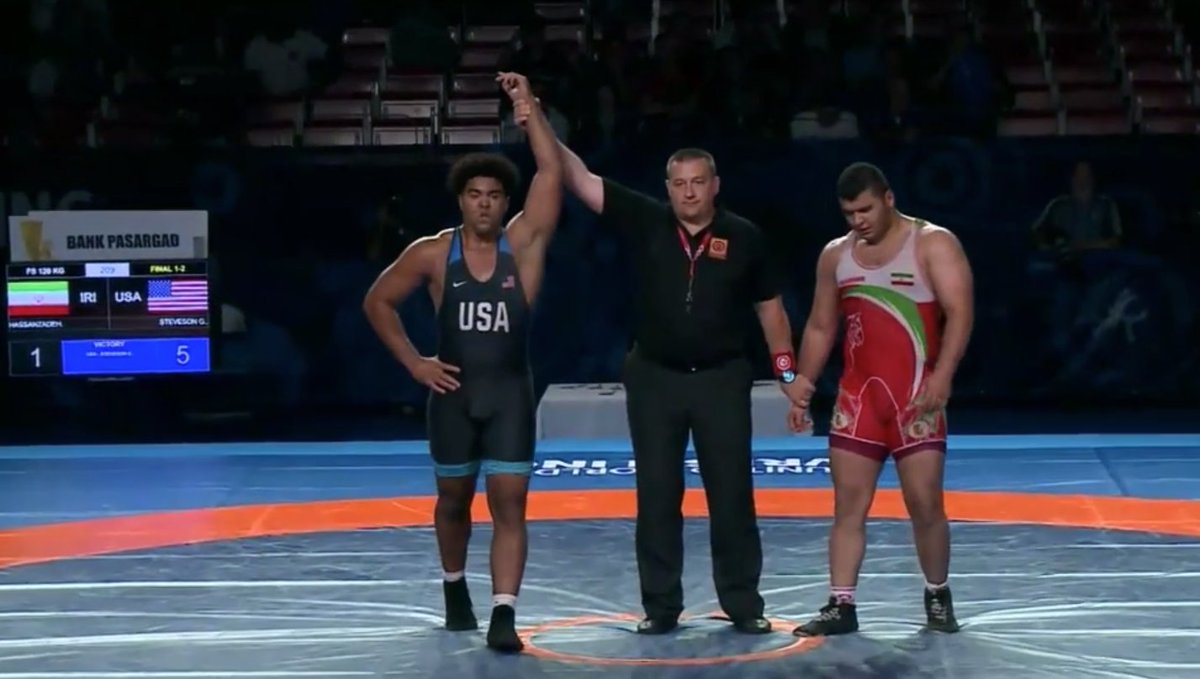 FloWrestling's tweet photo. GABLE STEVESON SEALS IT! HIS THIRD WORLD TITLE AND AMERICA WINS A WORLD TITLE! https://t.co/WA4uWzxu9U