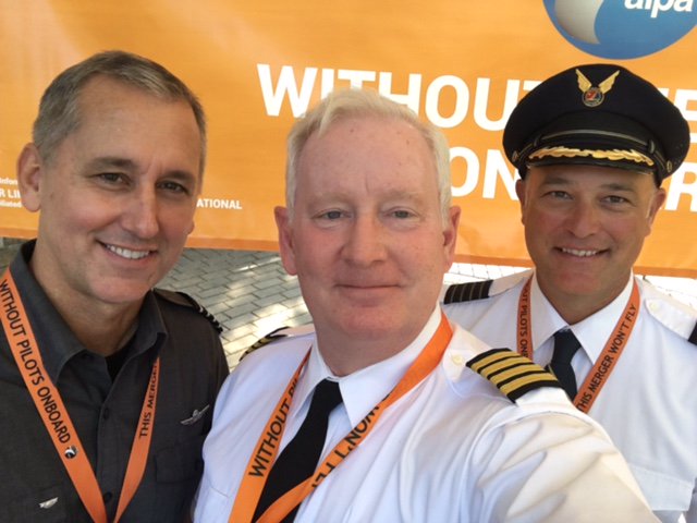 ALPAPilots's tweet photo. Capt. Tim Canoll and @AlaskaMECALPA/@vxalpa are ready to rally in SEA! #ThisMergerWontFly w/o the pilots on board: https://t.co/QblZ2BlQxE https://t.co/qpox8brc8d