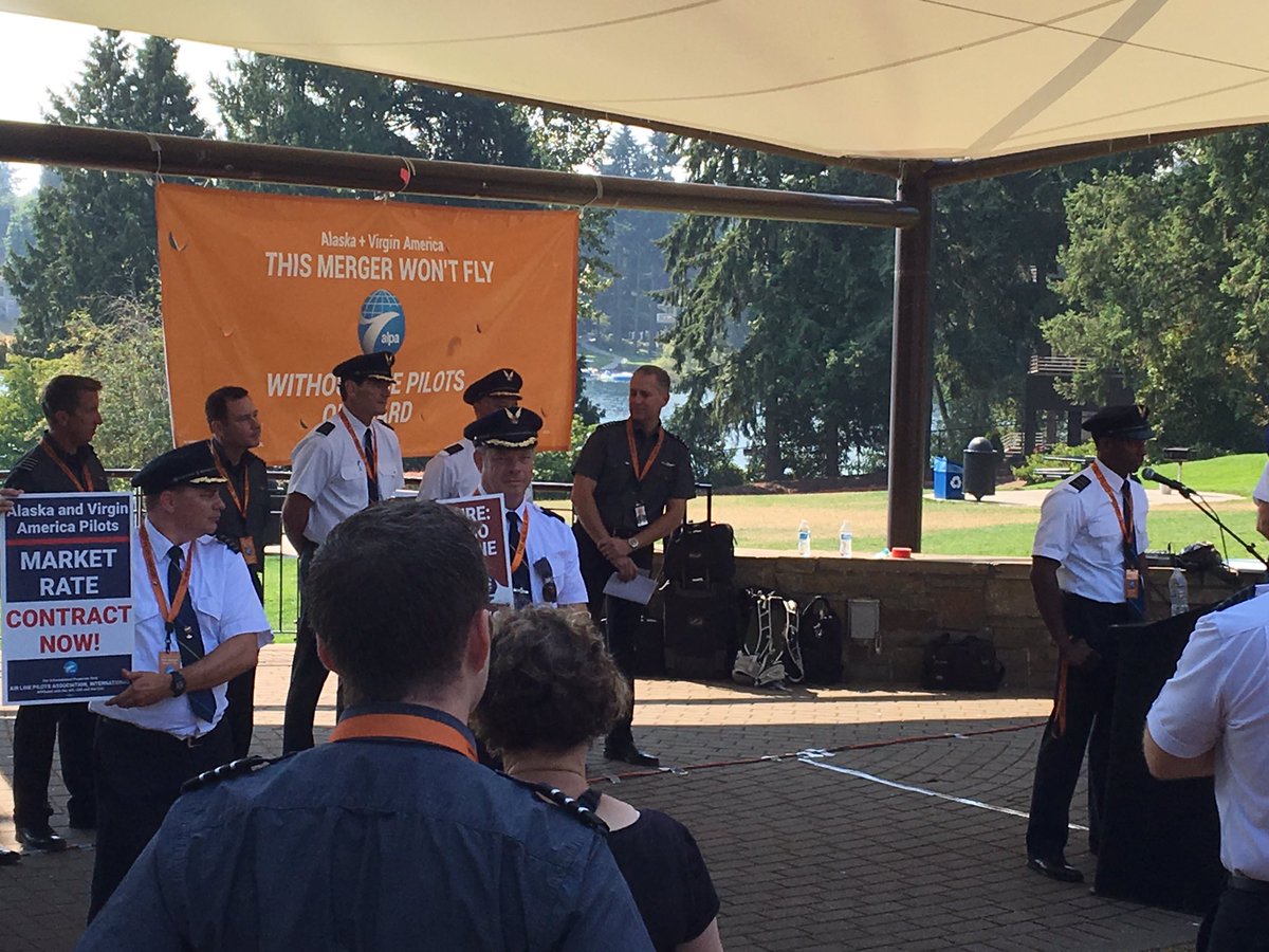 DavidWeaver's tweet photo. .@vxalpa &I @AlaskaMECALPA pilots getting ready to picket in front of @AlaskaAir HQ. #ThisMergerWontFly https://t.co/OAi1Qbadth