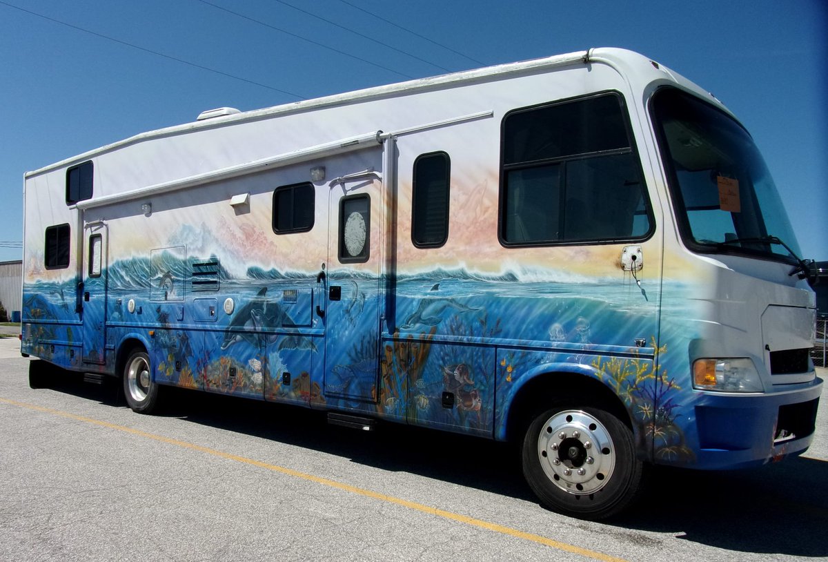 TotalValueRV's tweet photo. #UniqueRV sighting at #TotalValueRV! A hand painted #OutLawRV. Looks like we are putting on a passenger side mirror... https://t.co/DD7cmOx4km