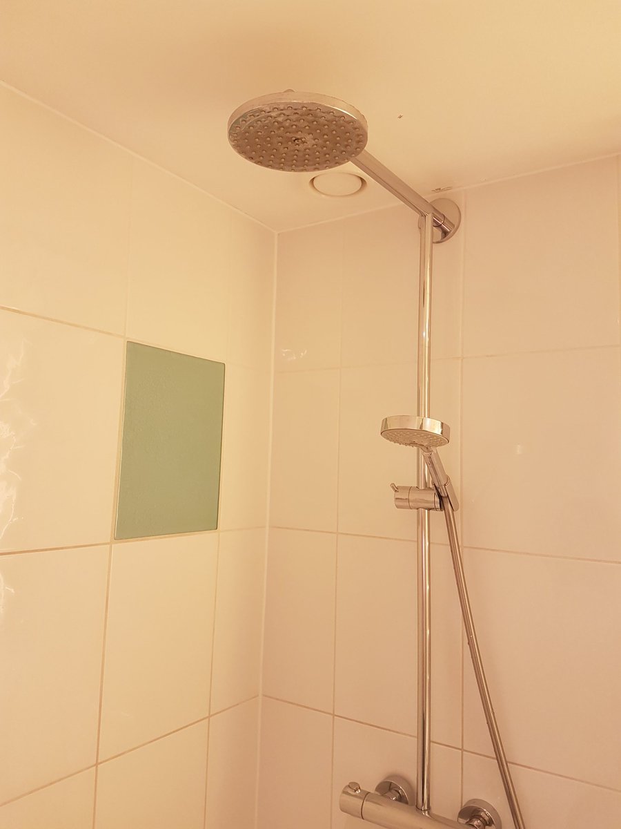RedBenchReview1's tweet photo. At a Hotel near Heathrow, this is the Deludge shower head 🤢. I'll use the Rail shower head then😕 https://t.co/TZQQfL1zW8