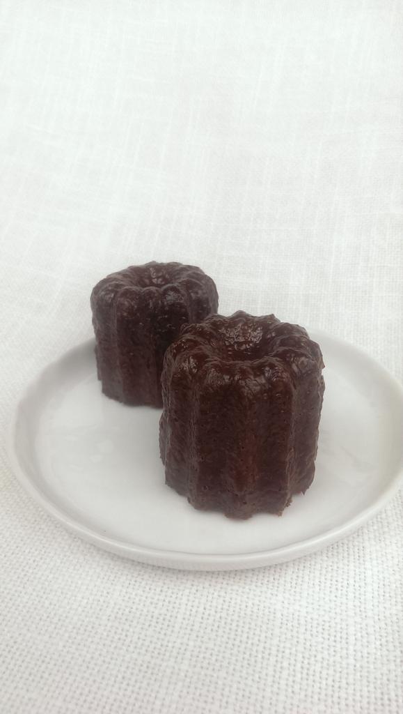 IronWhisk's tweet photo. I'm experimenting with canelé recipes, arguably the most complex French pastry. Here's test batch one! https://t.co/lmakilFWC0