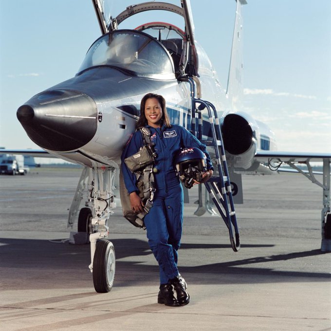 Astronaut Joan E. Higginbotham, STS-116 mission specialist, takes a break from training to pose for a portrait with a NASA T-38 trainer jet at Ellington Field near Johnson Space Center.