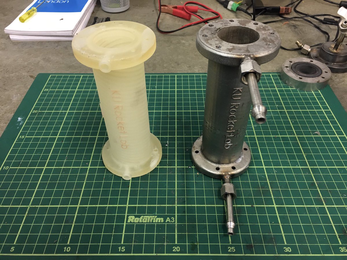 kurpgrockets's tweet photo. From model to metal. Both water cooled combustion chambers were #3Dprinted - note the helical cooling channels on the model https://t.co/KfckcXJYxu