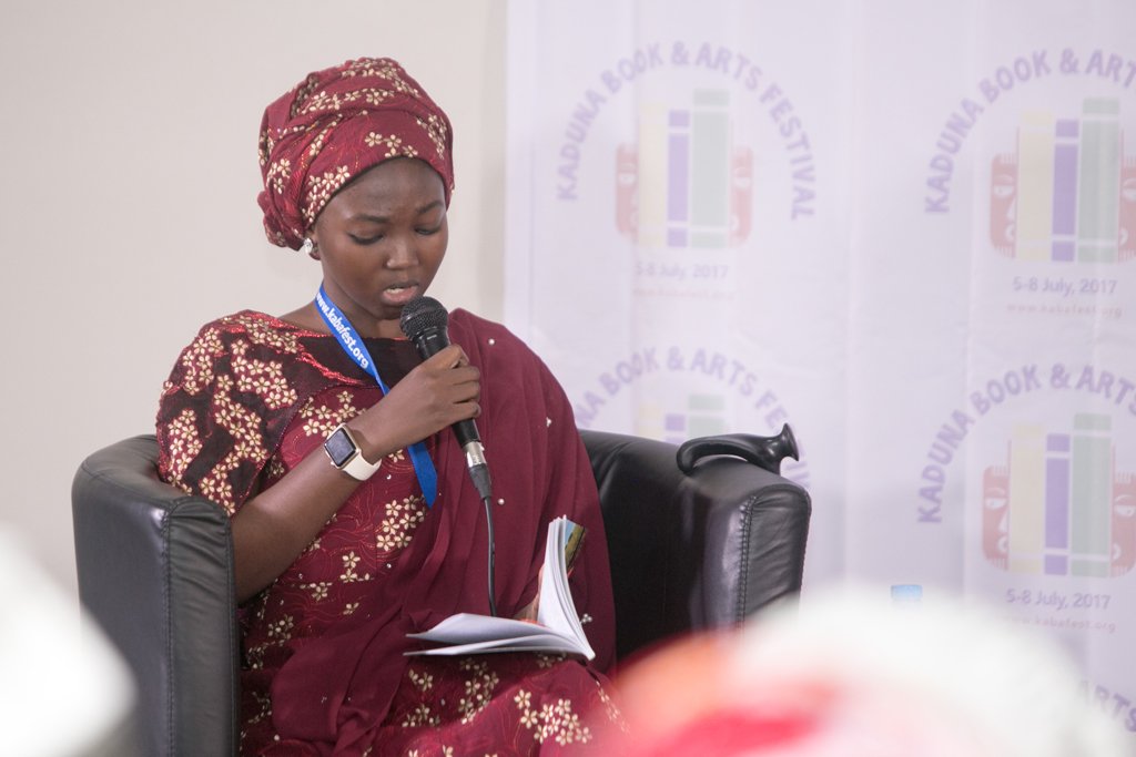 ssscfoundation's tweet photo. @Saamira_S @KabaFest @blf_fragrances @Maaryam_Ado @northernlifeng @Yadomah @BryteDude @AbusidiquBlog @Ozo1Naija @dr_khalidz @temite As the discourse progressed, @Saamira_S had to read excerpts from her book: #SisForSurvivor... #KabaFest17 #ThrowbackThursday #TBT https://t.co/gdQ3N1LPGp