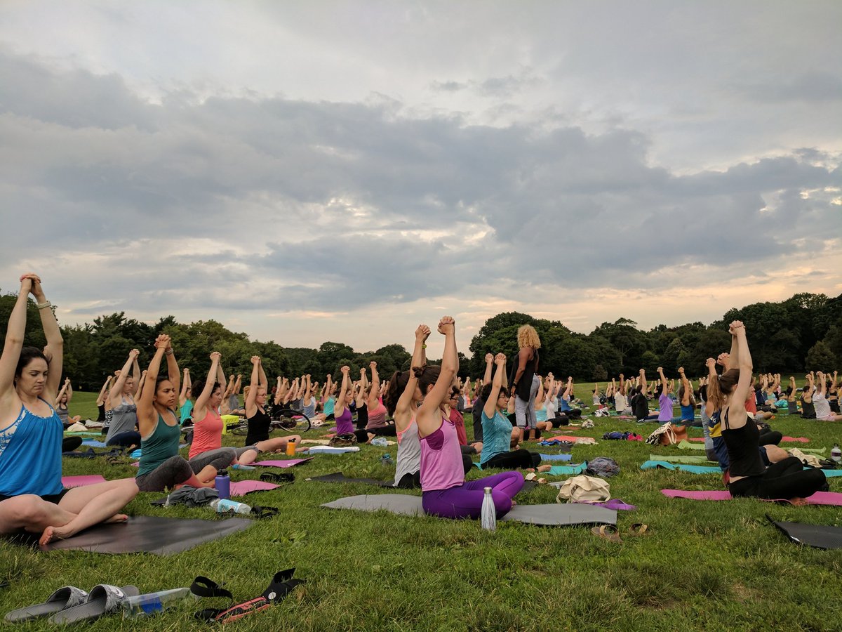 TNRbrooklyn's tweet photo. #HappeningNow: power #yoga with Jyll, owner of @urbanasanas under a dramatic summer evening sky in #ProspectPark. https://t.co/YbLmCPvXT7