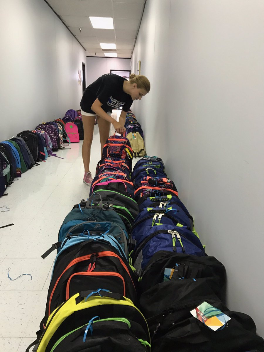 Ravonics1710's tweet photo. We stuffed more than 1,800 backpacks with supplies to give to schools in our district! #morethanrobots https://t.co/c5wFvRb8iH