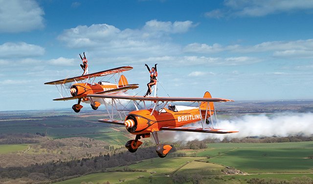 ShuttleworthTru's tweet photo. Uncommon sight at Shuttleworth at #edwardianpageant of the Breitling Wingwalkers, will be fun :-) https://t.co/HBoYFrSXl1