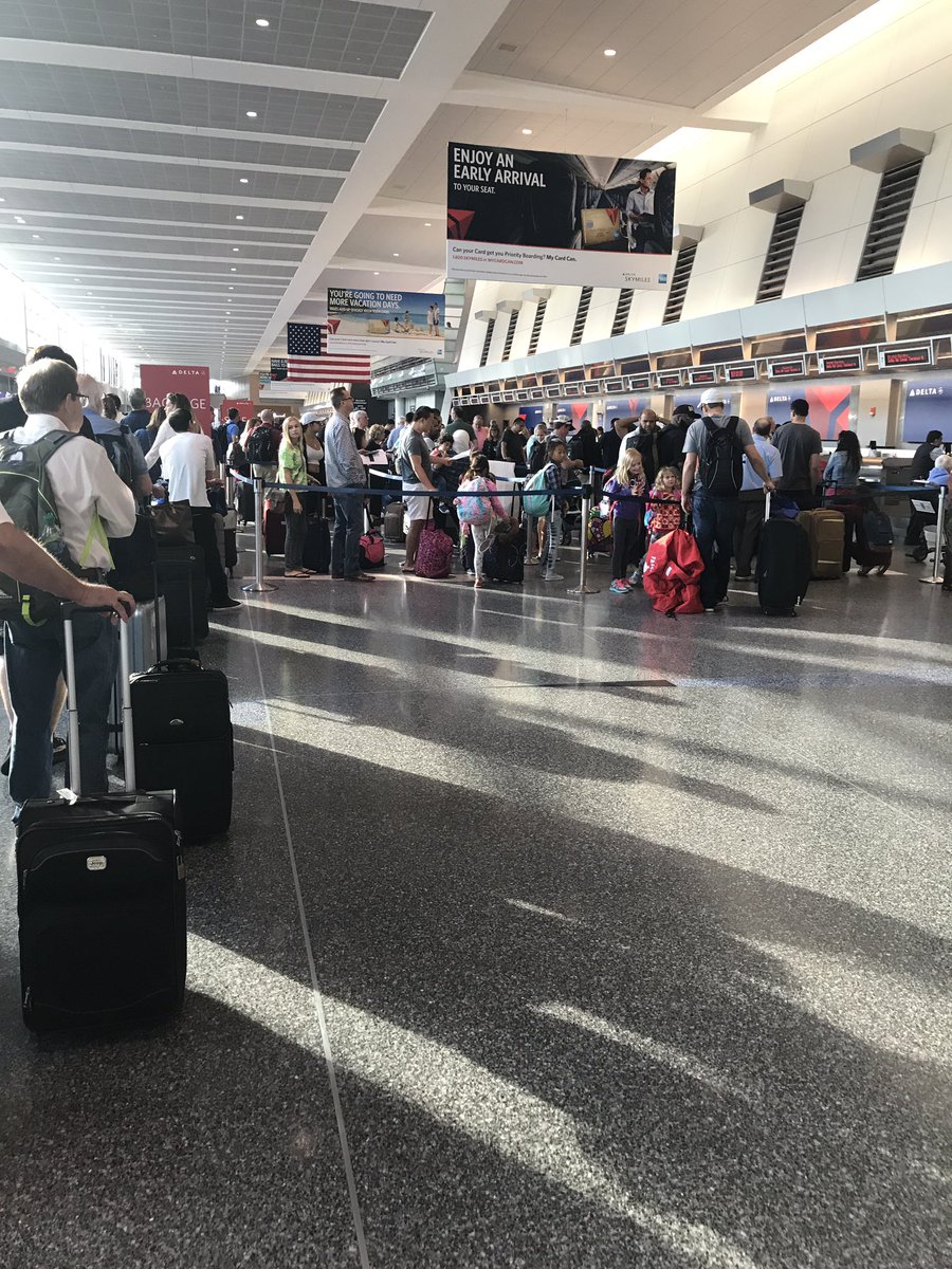 weplayshirts's tweet photo. What's going on here @Delta? Bag drop @BostonLogan is an hour plus wait. #sendreinforcements https://t.co/BI66bDoRXz