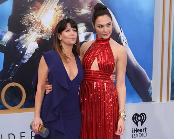 GalGadot's tweet photo. #FBF to standing on the blue carpet with our fearless leader, Patty Jenkins, for the @wonderwomanfilm premiere. https://t.co/nzZL9lZI8i