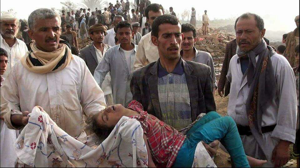 SamWalton's tweet photo. The bodies of children &amp; adults are pulled from the rubble in Yemen. Until we  #StopArmingSaudi we are complicit in these war crimes. https://t.co/2KKeHuuiDb