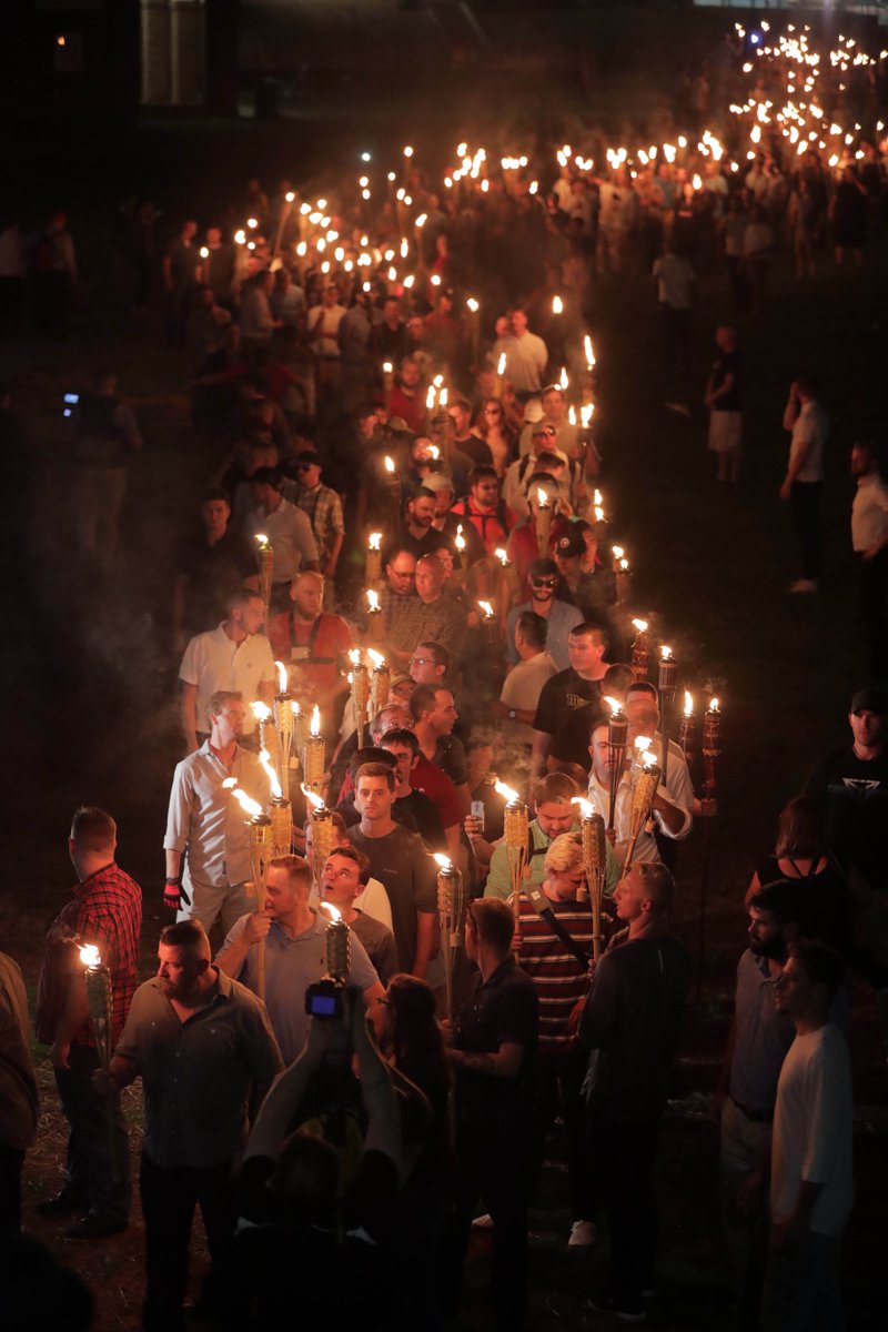 DailyProgress's tweet photo. PHOTOS: #UniteTheRight torch rally at UVa ends at the Rotunda and in violence. #Charlottesville
https://t.co/5p1b2cDP5k https://t.co/cdXa7PtiuE