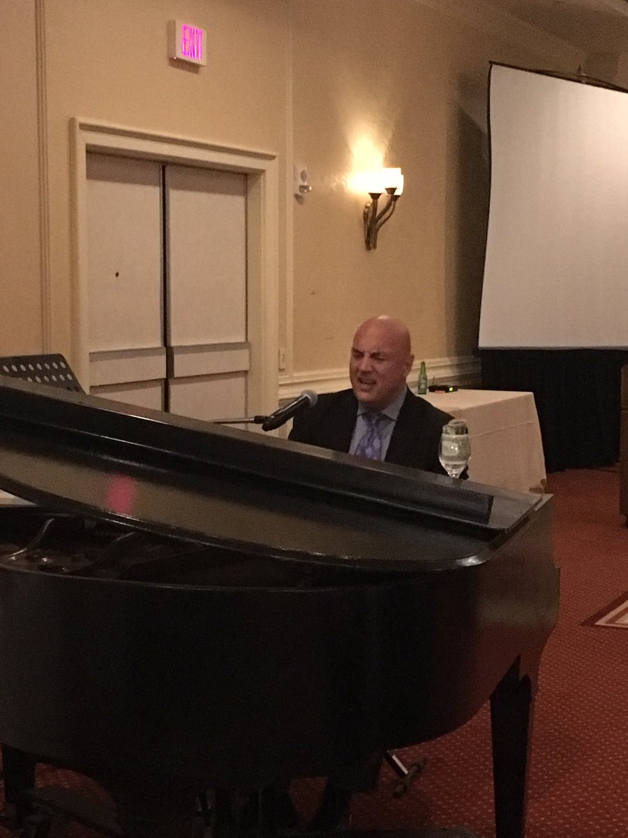 NECDDRE's tweet photo. @johnangotti busting out some @billyjoel classics at the end of a full day of #NEConvo ! 🎤🎼🎹 #SingAlong #PianoMan https://t.co/r1zlMGxL6k