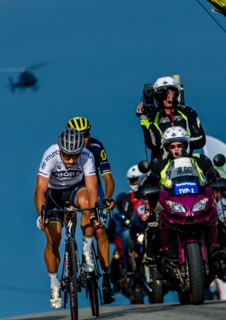 TVMIntl's tweet photo. Great day on the bike at Tour of Poland with Peter Sagan https://t.co/8p3YrAhozO #1mototeam #motocam @SpeedMetalCycl @AmgenTOC @ampvisualtv https://t.co/1jmDQIntLU
