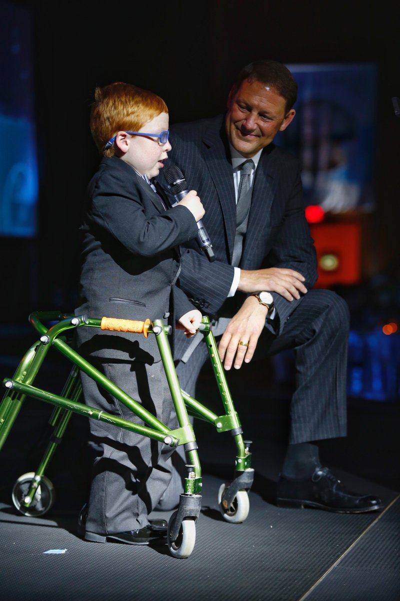 The 2017 Color of Hope Gala Champion Child, Evan Lee with Charles Redfield. #CareCloseToHome