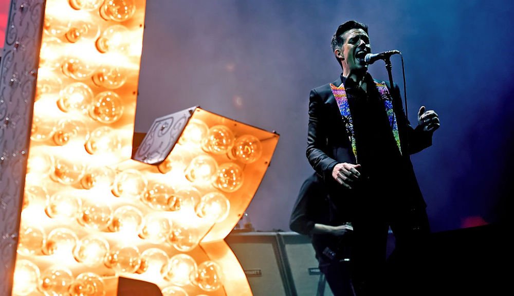 NME's tweet photo. Watch The Killers cover Muse and Smashing Pumpkins during their Lollapalooza set https://t.co/Q40rVo2zdK https://t.co/wq4BNJsBmQ