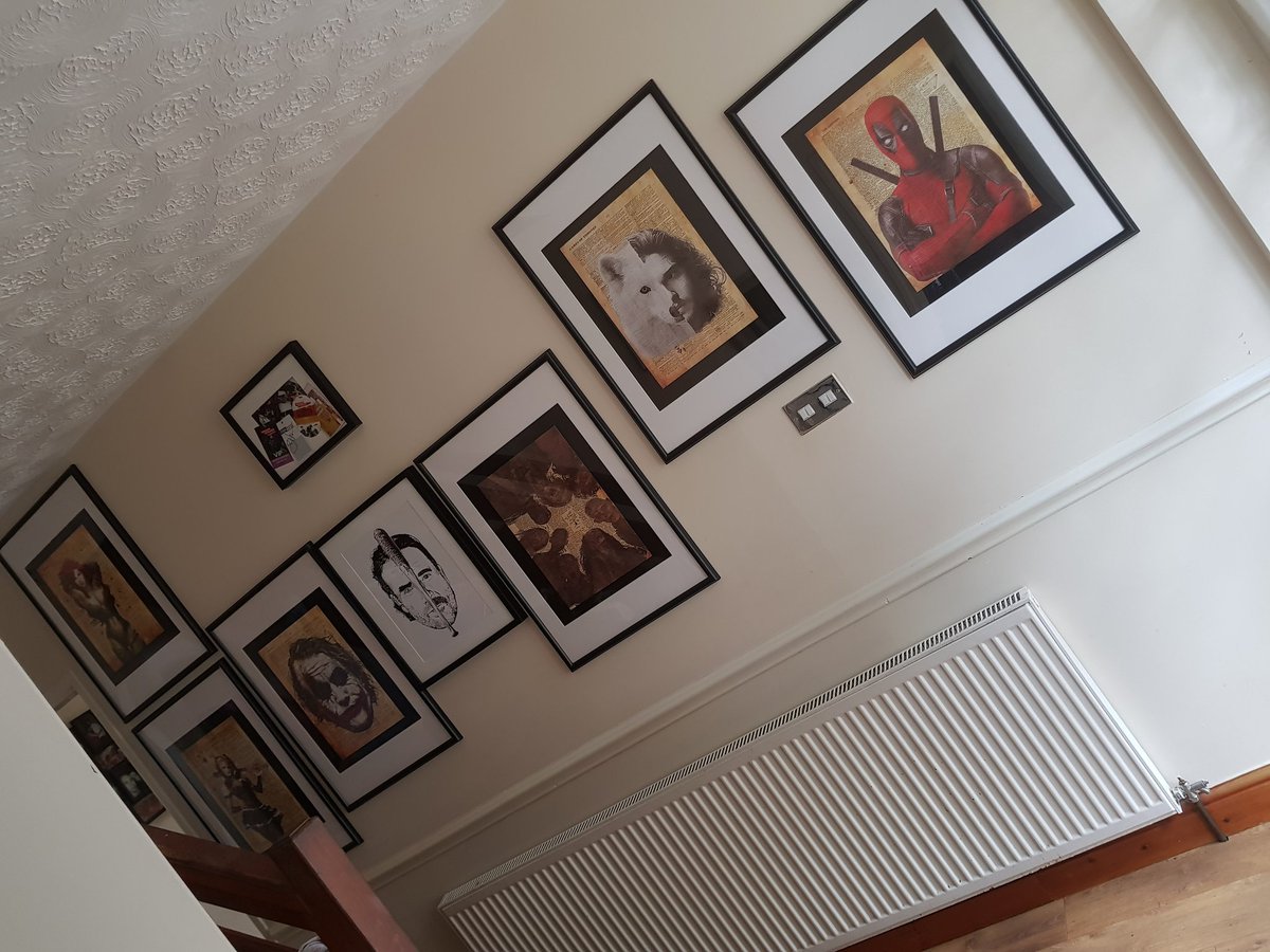 Miss_woods21's tweet photo. Nerding up my downstairs hall 💪 @HeadshotHQ #alloutwar print taking pride of place 😍 just shelves needed now 😁 #TheWalkingDead #GOT #heroes https://t.co/uUkfy4o7PD