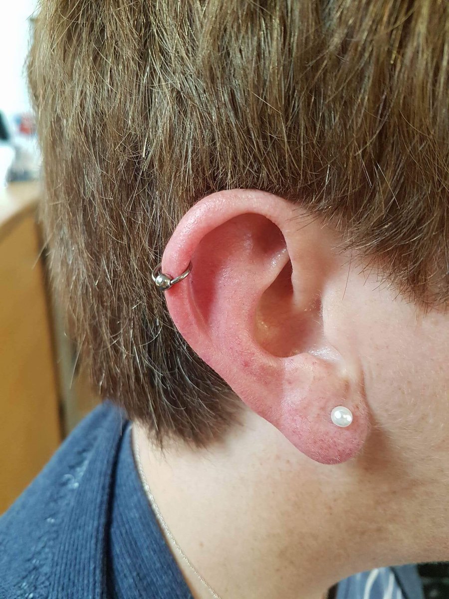 The Dayak tribe of Borneo wear bear teeth from their upper ear as the sign of a brave headhunter. #PiercingFacts
