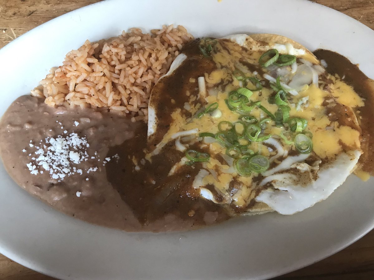 Lobobrooklyn's tweet photo. #HuevosRancheros- wolf style (one fried tortilla, smothered in carne sauce). Not too photogenic, but so tasty! Every day till 3pm. #brunch https://t.co/ou2nDcG6gS