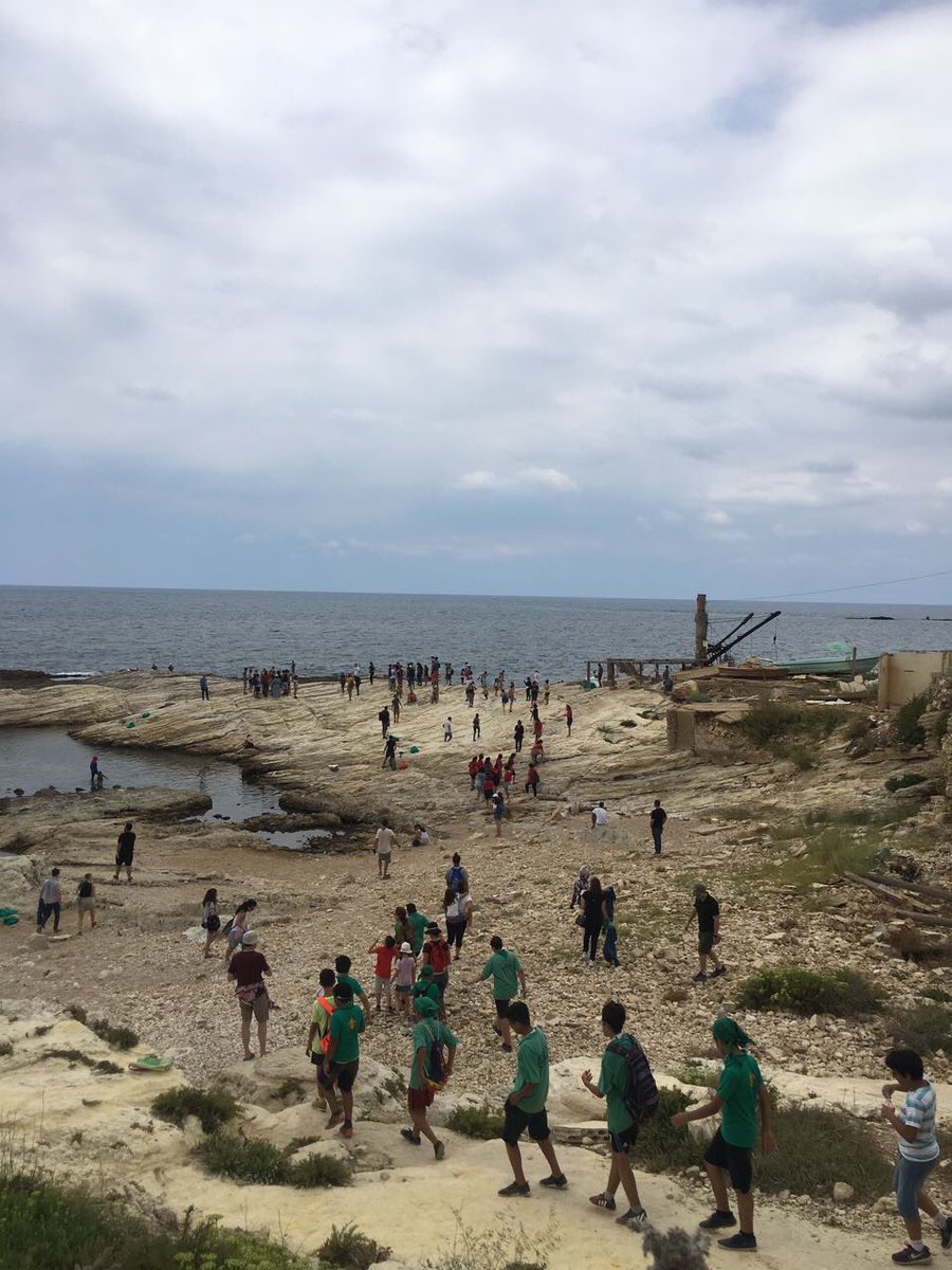 mashrou3leila's tweet photo. Thank you to everyone who helped at the raouche cleanup today! All waste collected used in a massive installation at our @ehdeniyat concert https://t.co/H4NLaBTToK