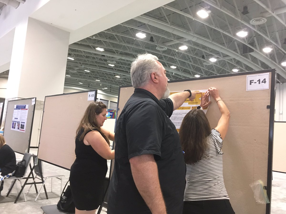 Div26HOP's tweet photo. How many #Div26 members does it take to hang a poster? It's #ECP poster time! Come find out why you need to hang out with us #APA2017 (F-14) https://t.co/iiY1eiaRbO