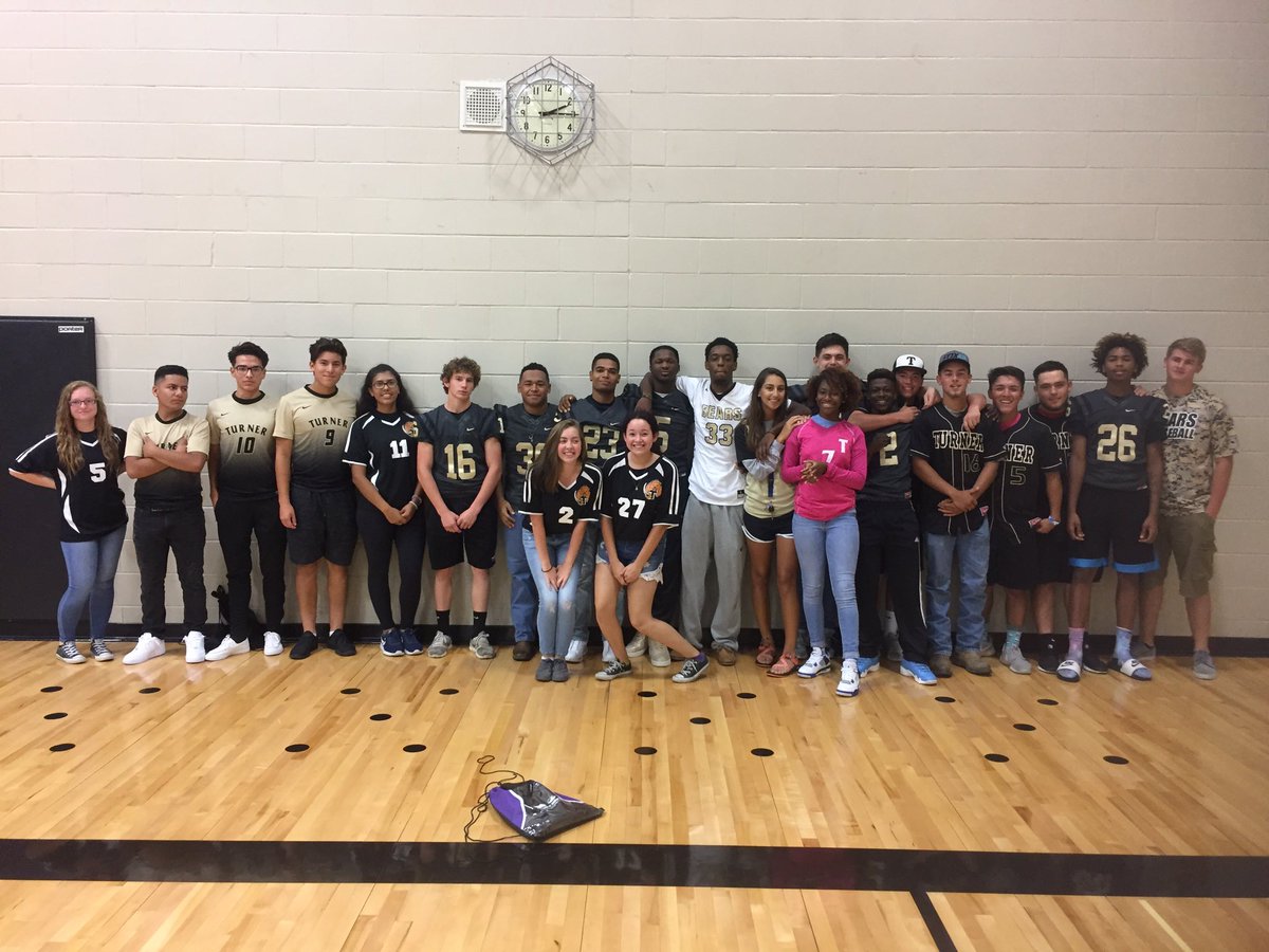 Awesome job passing out backpacks to kids in the community today, Turner athletes!