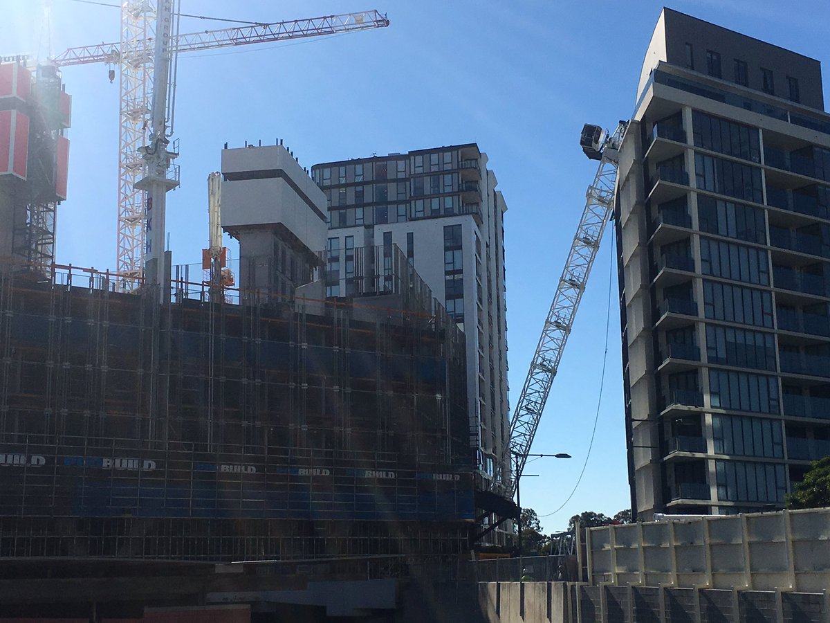 Construction crane collapses on Sydney apartment building