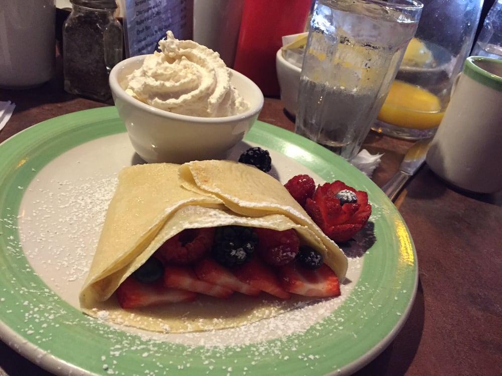 Melissasbanff's tweet photo. Mixed Berry Crepes served with fresh cream!  Mmm, who doesn't like crepes? https://t.co/f3jKeNcX8C
