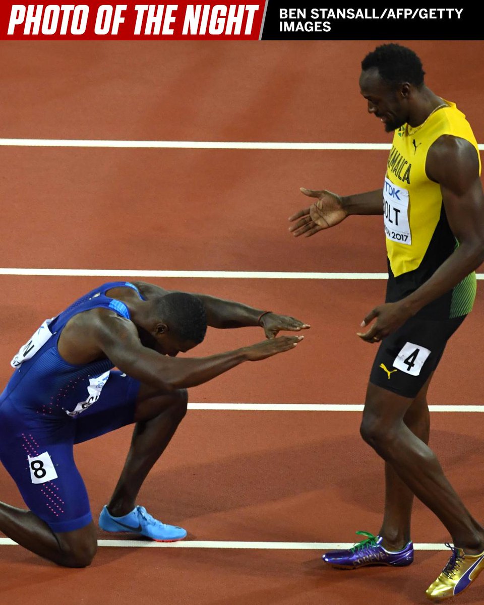 espn's tweet photo. Justin Gatlin honors Usain Bolt in the great's final 100m race. #PhotoOfTheNight https://t.co/H8U6Lw4hCt