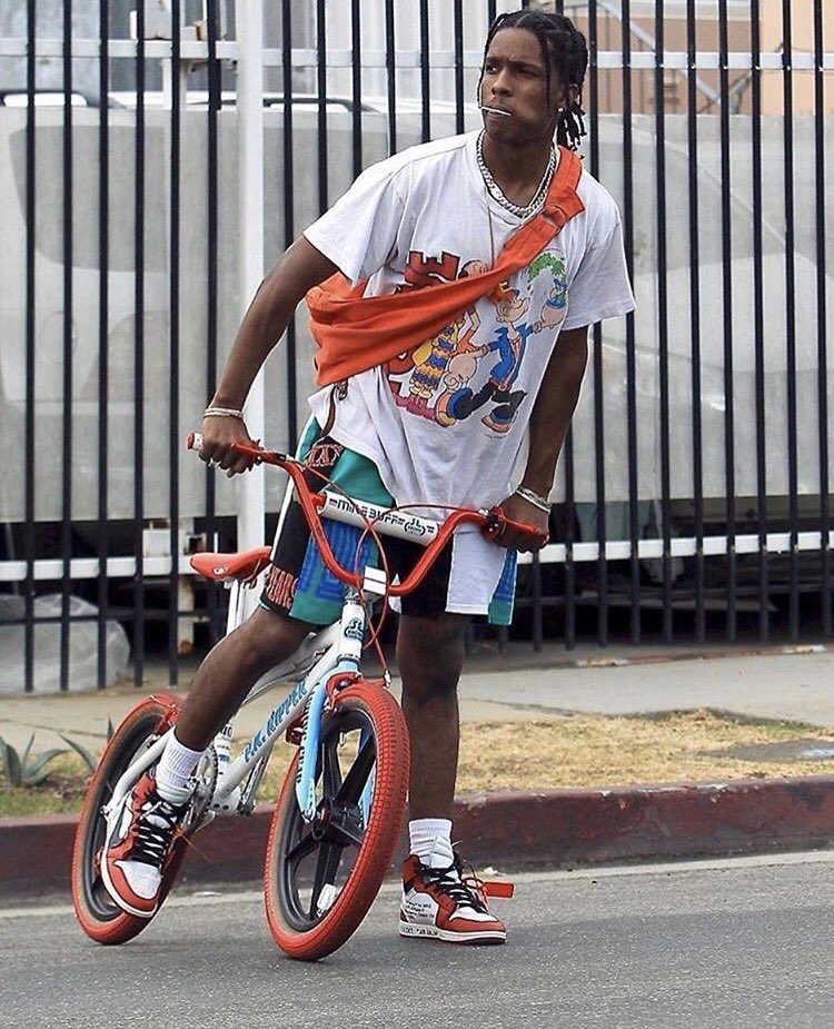 A$AP Rocky's bike matches his outfit. He is on another level.