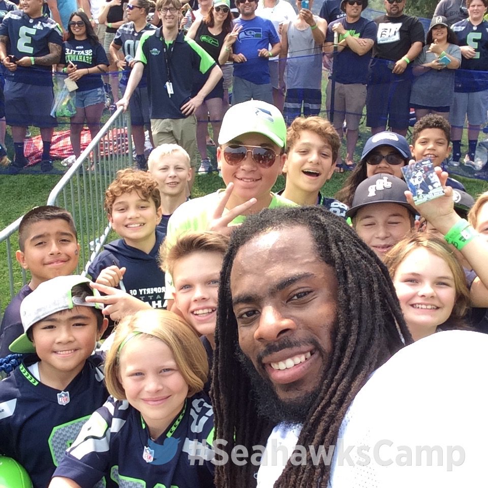 Seahawks's tweet image. Giving the next generation of 12s some love. @RSherman_25 #SeahawksCamp
