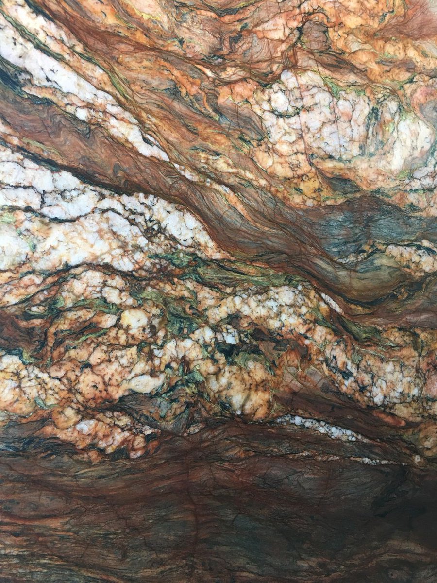 StonevilleUSA's tweet photo. Our #Fusion #Quartzite looks like a stained glass window. Such a #beautiful, #durable, &amp; #stainresistant natural stone! #countertop #remodel https://t.co/Evq9aWadIJ