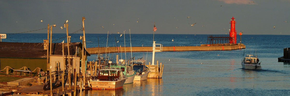 One of our local favorites #NationalLighthouseDay #Algoma #Wisconsin #lakemichigan #salmon #charterfishing #Fishouflage