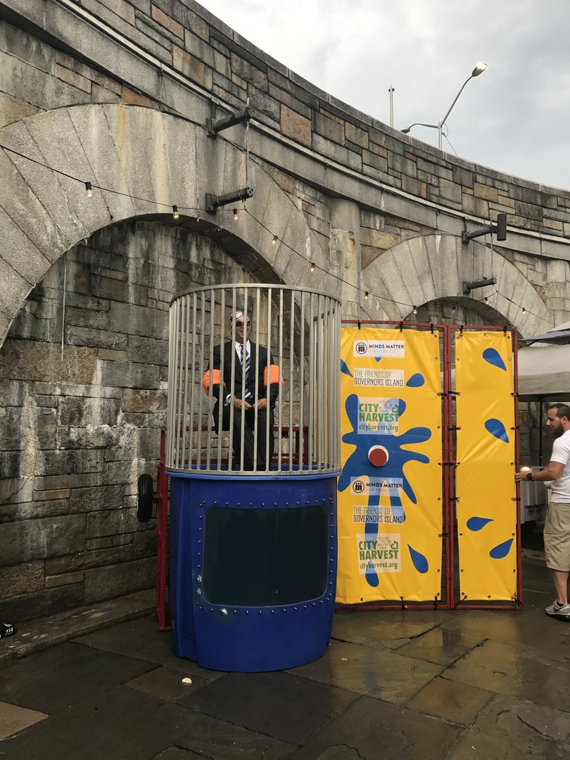 BlackRock's tweet photo. At our annual NY summer outing, #BlackRock employees raised $60k+ for @CityHarvest @mindsmatterNYC @Gov_Island by bidding to dunk our execs! https://t.co/b8UyxQfORr