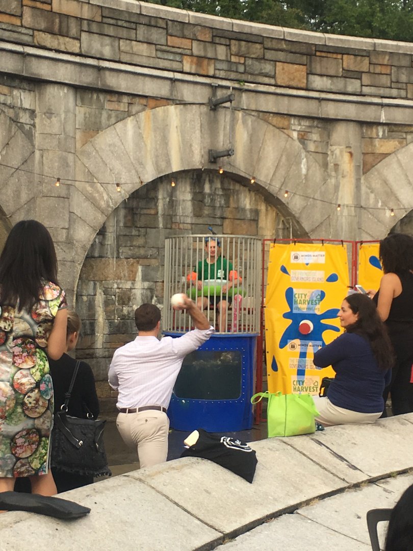 BlackRock's tweet photo. At our annual NY summer outing, #BlackRock employees raised $60k+ for @CityHarvest @mindsmatterNYC @Gov_Island by bidding to dunk our execs! https://t.co/b8UyxQfORr