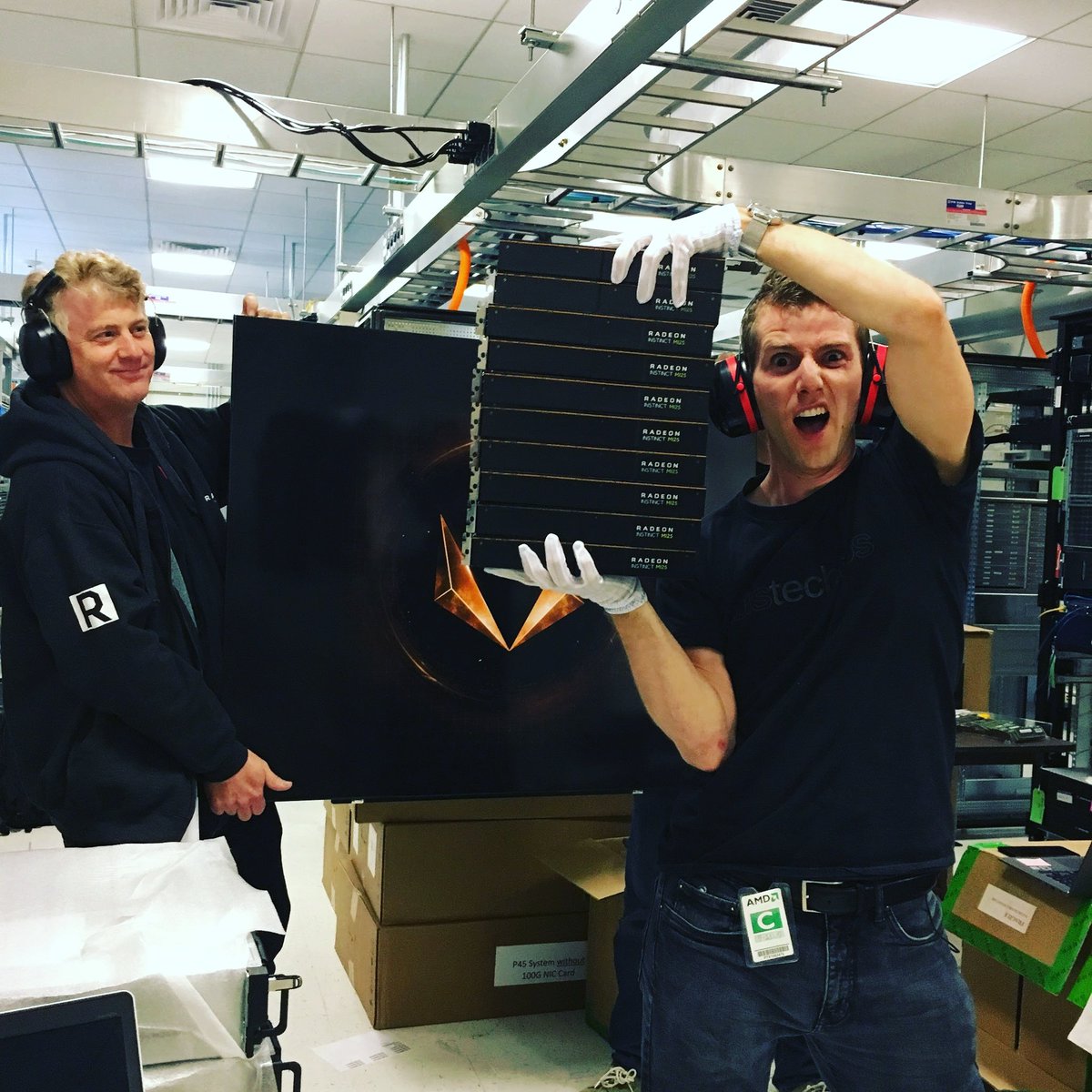 LinusTech's tweet photo. Uploading! Git yet RT buttons primed! AMD let me build a node of their shiny new supercomputer! https://t.co/RtSMD9TKqT