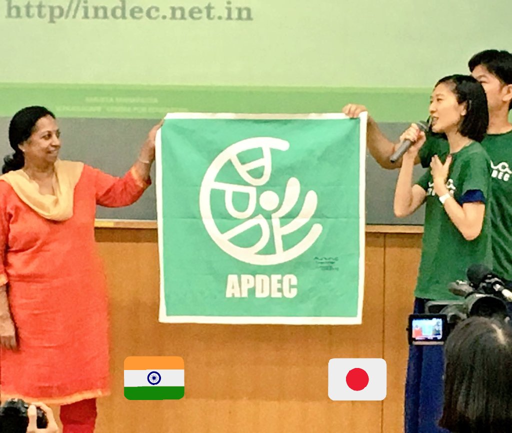 indeconf's tweet photo. Overwhelming moment for Amukta Mahapatra as she receives the APDEC flag+logo from @TOKYO_APDEC after announcing IDEC@APDEC 2018, India. https://t.co/CkKtwsZ3JG