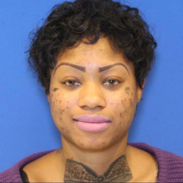 DC woman with bow tie tattoo arrested for allegedly trying to cut man's  throat with knife | WJLA