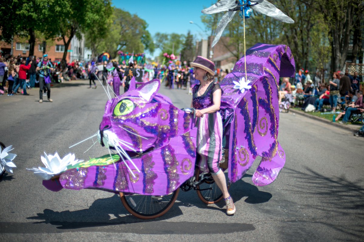 HOBT's tweet image. Happy #InternationalCatDay from In the Heart of the Beast Theatre! Photo by Max Haynes from the 2017 #MPLSmayday parade.