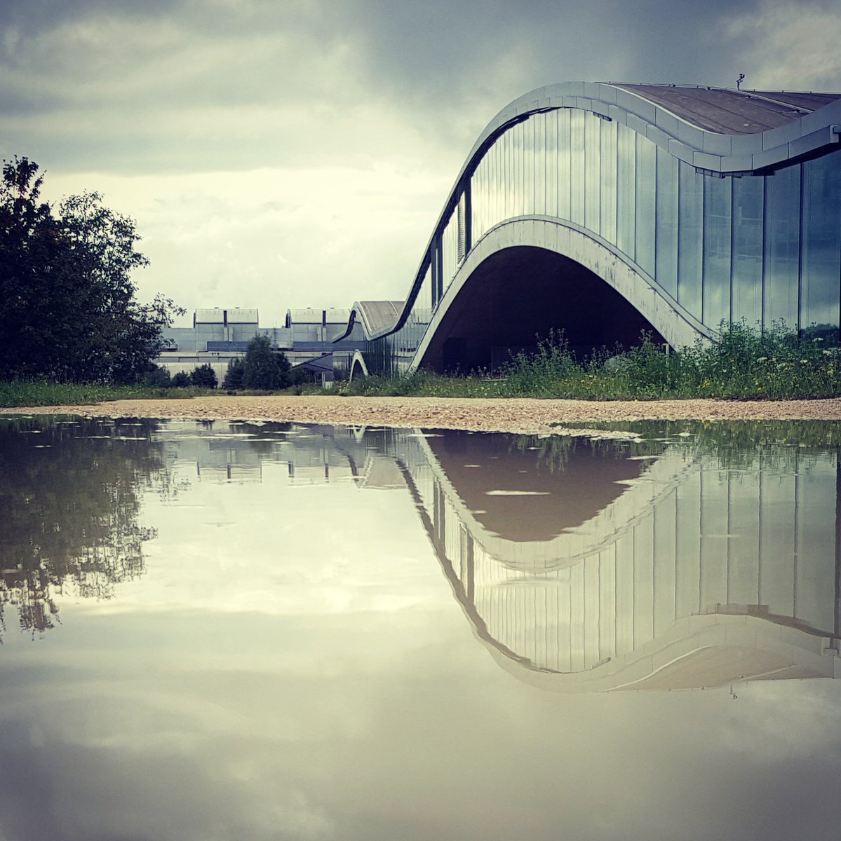 It only takes one rainy day at <a href="/EPFL/">EPFL</a> for a double #Rolex Learning Center to appear ☔