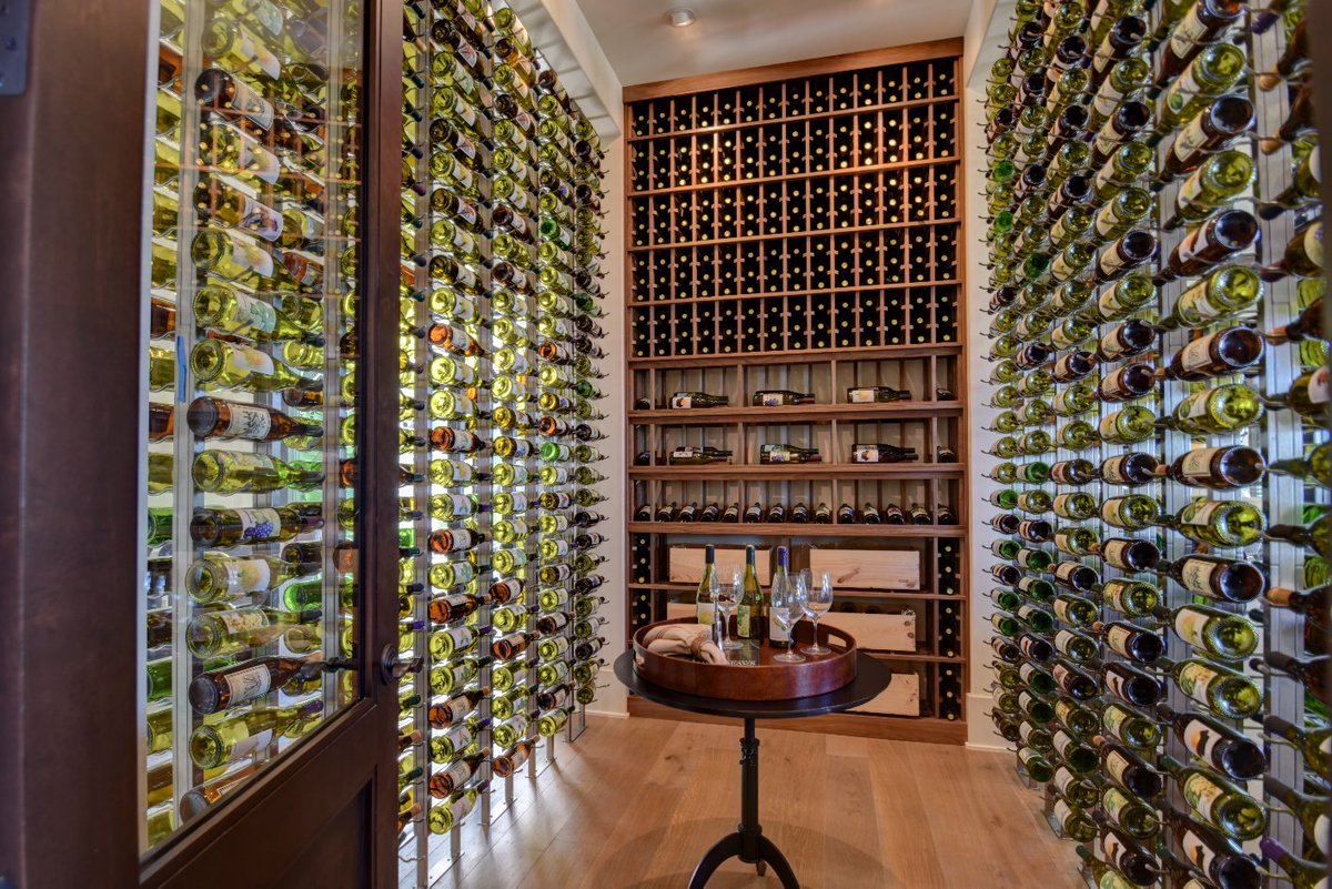 ModWineCellars's tweet photo. A bit traditional but with a flair for the modern in this #labelforward #winecellar design by @VintageCellars #vintageview https://t.co/cikW5uyfUk