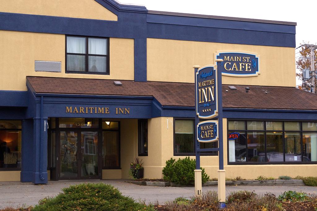 TIFDESIGNSTUDIO's tweet photo. Here is some signage we did for The Maritime Inn in Antigonish NS. Carved and goldleaf signs. https://t.co/3IDeV53kWz
